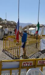 Příprava vlajky na vyhlášení